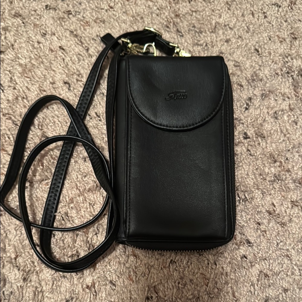 Compact Black Leather Crossbody Bag with Gold Accents